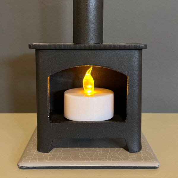 Mini Log burner with tealight. Front view